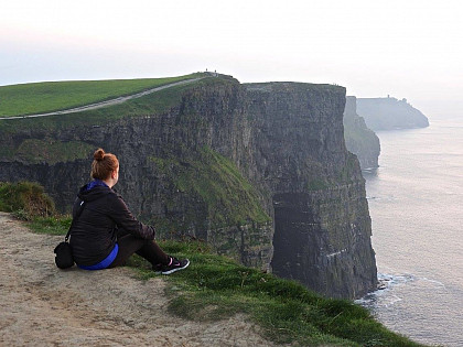 Taylor Moxley overlooking the Atlantic Ocean in Ireland.