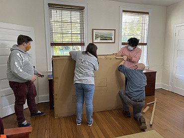 Members from Civic Leader Scholars assisted in assembling furniture for the Project Room in the A...