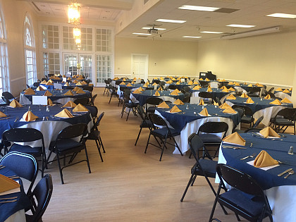 The Board of Visitors Lounge set up for a banquet style setting, available for up to 130 people.