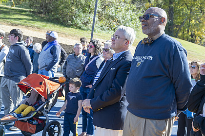 Family, friends, faculty and staff at Eric Scott '88 Memorial Court dedication