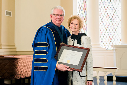 The Fred Selfe Distinctive Service to Emory & Henry Award recipient Virginia “Ginny Rowland Barker '59 with President Jake...