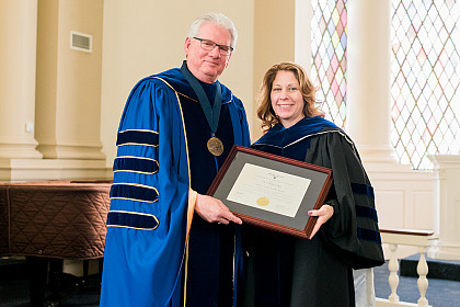 The James A. Davis Faculty Award recipient Dr. Celeste Gaia with President Jake Schrum