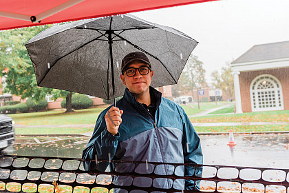 Homecoming 2021: The rain at the homecoming game requires some folks to bring an umbrella.