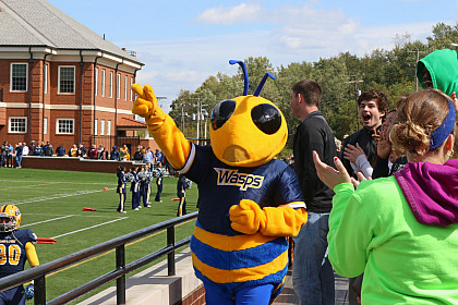 Go Wasps! Our mascot rallies the crowd at a football game.