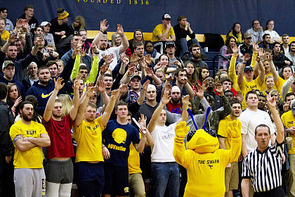 The Swarm, a student club geared towards supporting athletics, cheers along supporting athletics here at E&H.