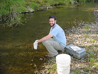 Alumnus Michael Swanger monitors a stream as part of his job for the Tennessee Dept. of Environme...