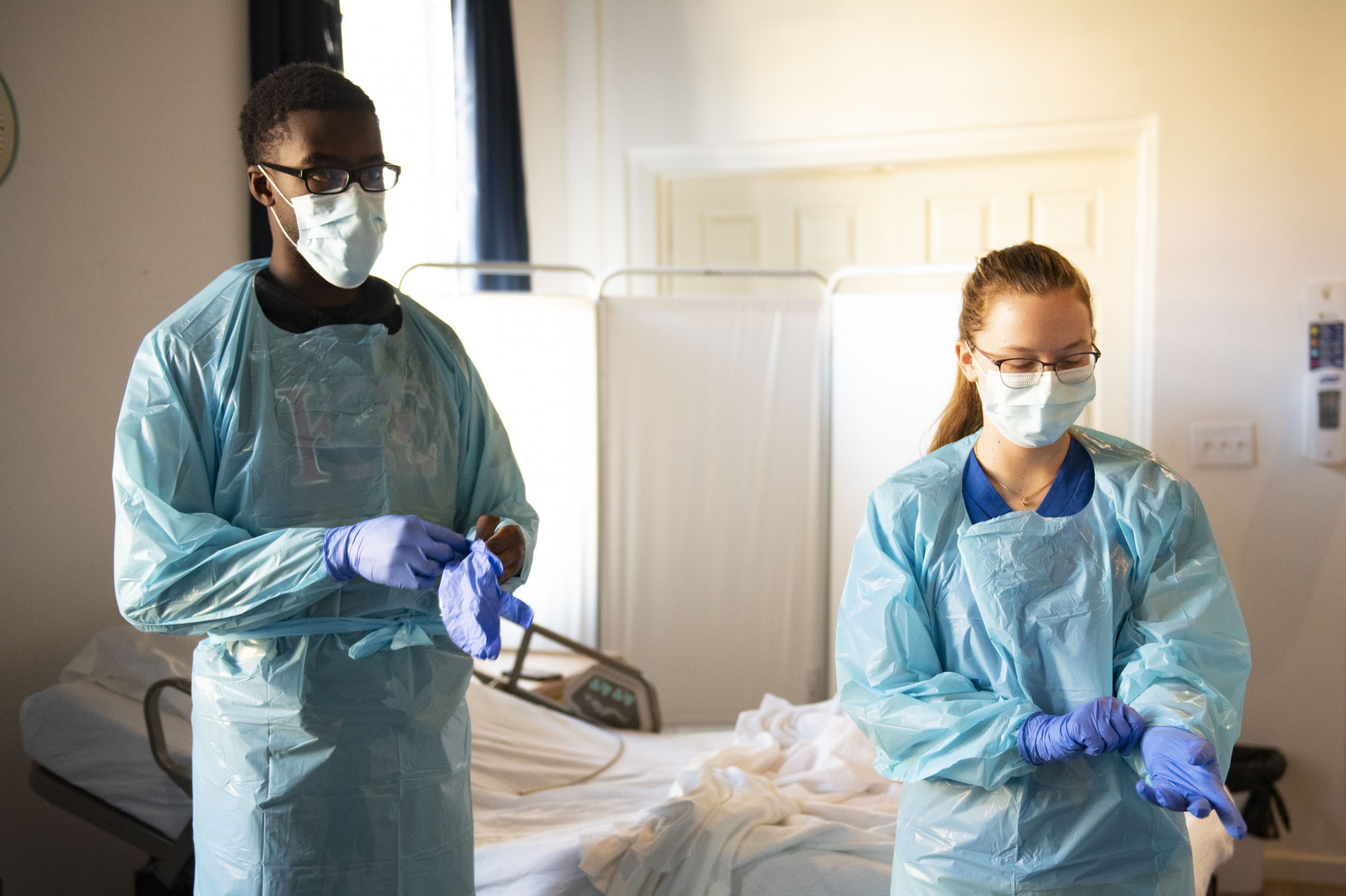 CNA students donning PPE