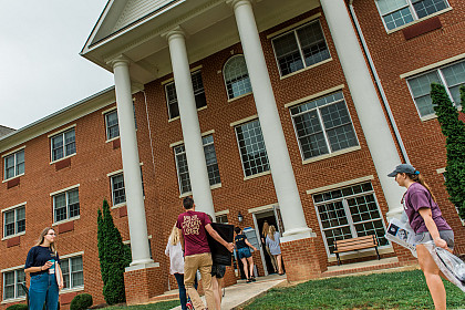 Students moving into the dorm.