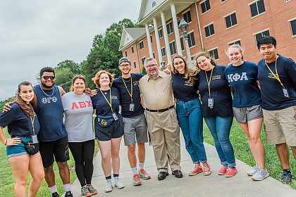 John Wells with students during Move-in Day.