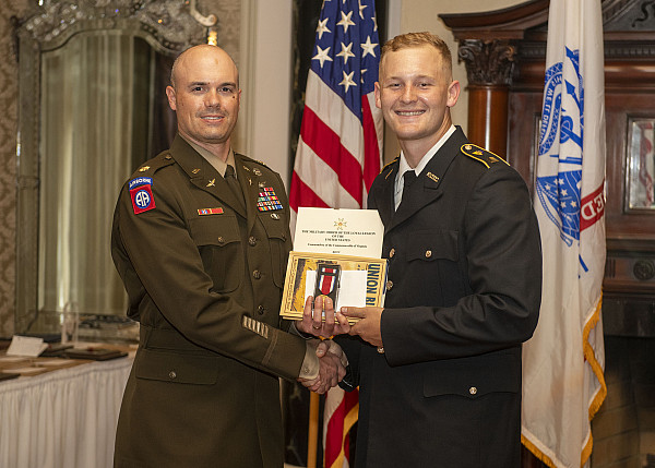 Zane Seymore, '22, being awarded by LTC Monas, ETSU professor of Military Science, while Seymore was a member of the ROTC program/