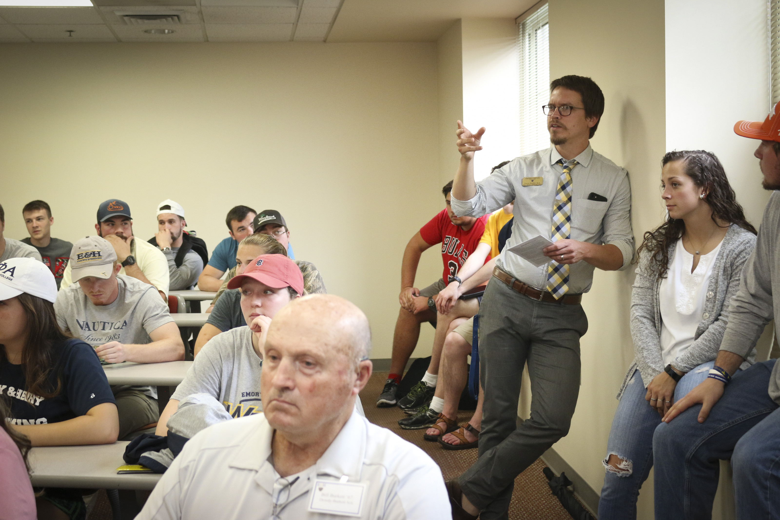 Prof. Travis Proffitt asks a question during a session at Ampersand Day 2017.