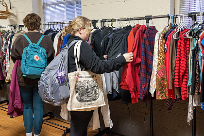 A student is shopping for clothes