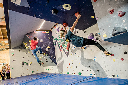 Students using the new climbing crag.