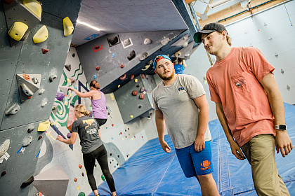 Students using the new climbing crag.