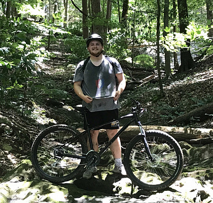 Matt with his mountain bike.