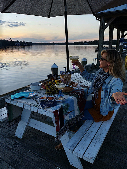 From Laura Craven Duncan '84, Hertford, NC: Our romantic little tailgate for 2 ended with a beautiful sunset over the Albemarle sound. Su...