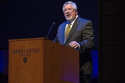 Emory & Henry College President Dr. John W. Wells speaks to an audience of guests witnessing the arts programs founders being honored...