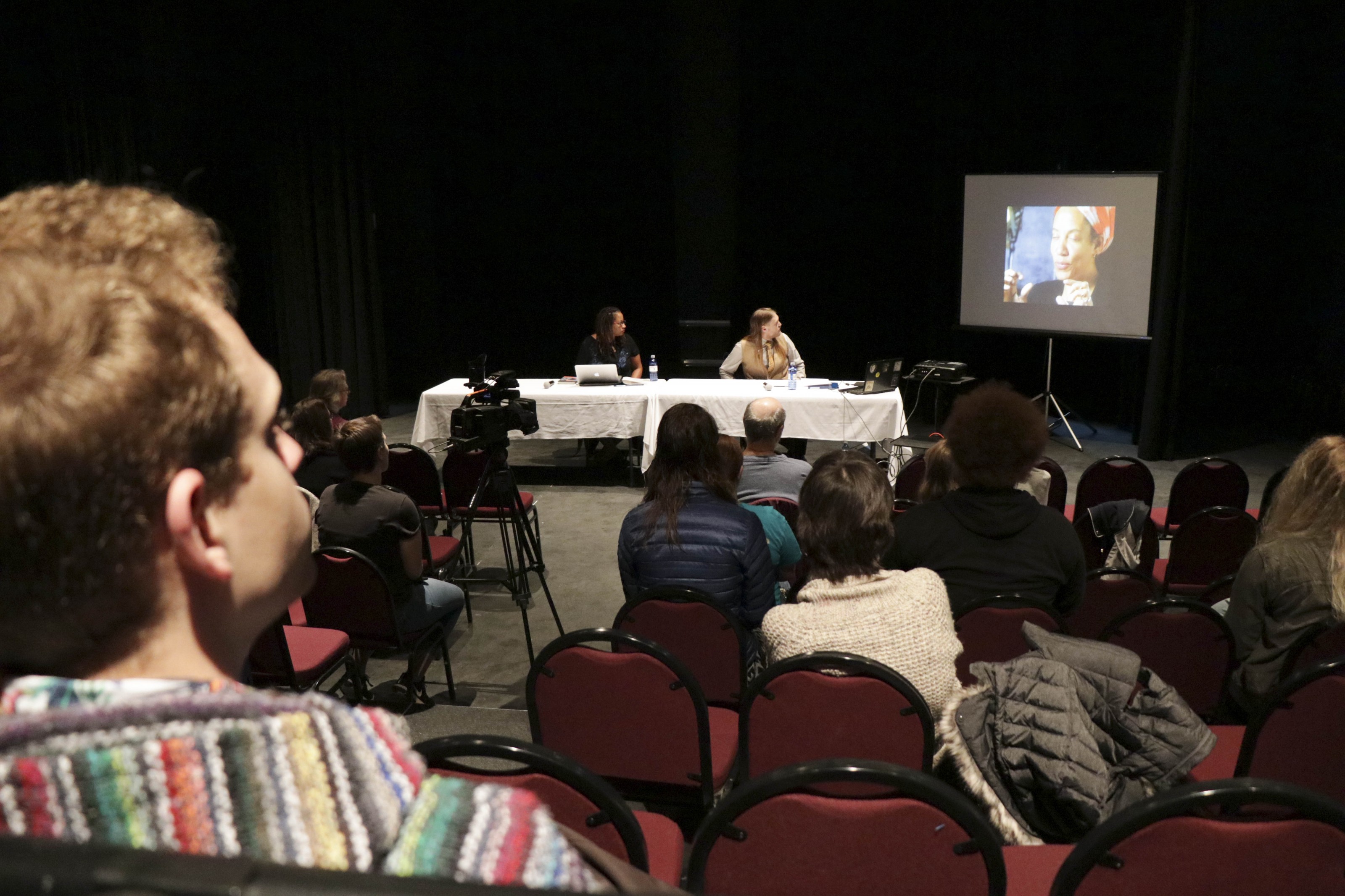 Forrest Yerman leads the crowd in a discussion