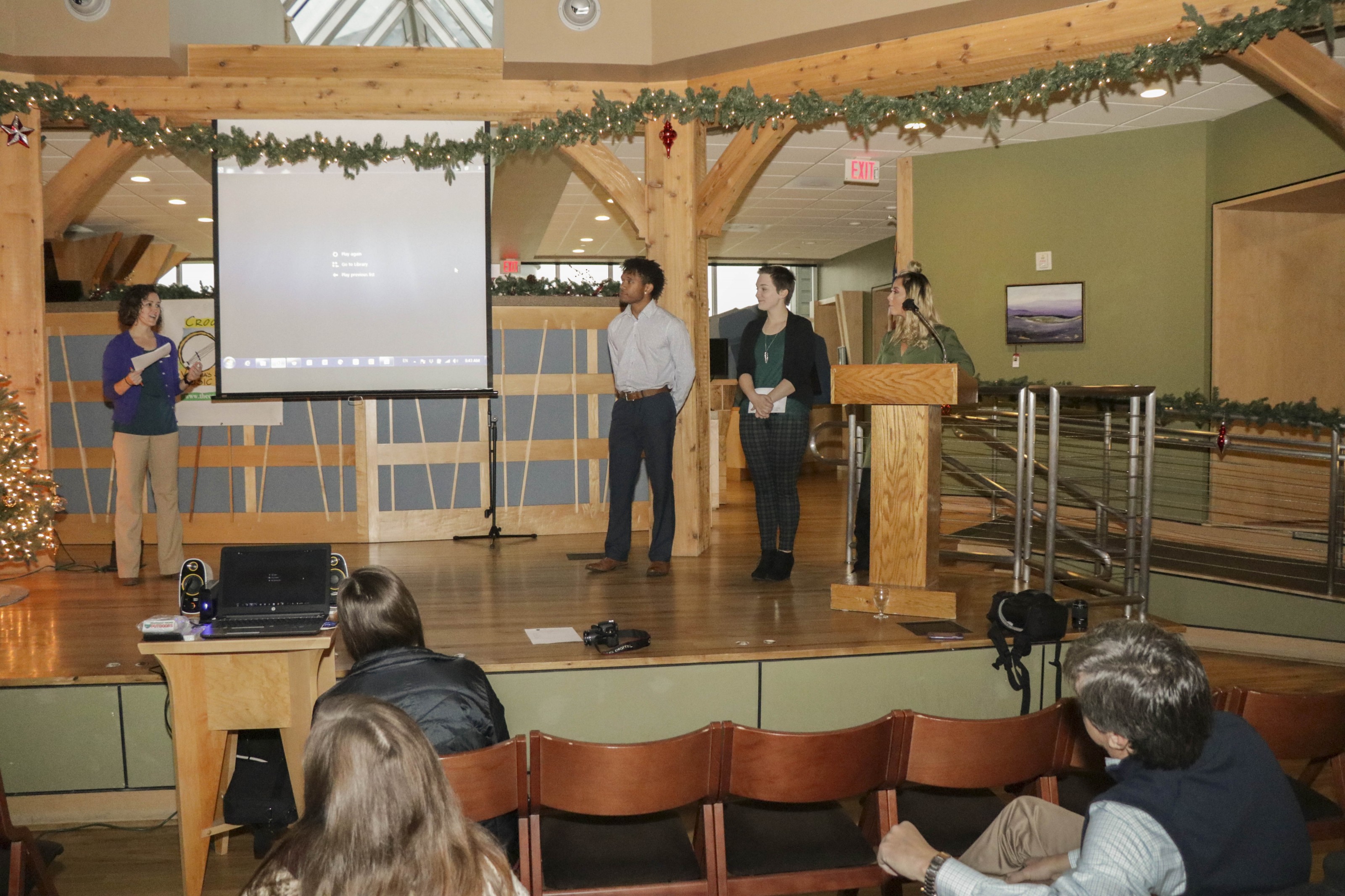 Students (L to R) Desmond Perry, Allison Hamilton and Madisson Gillespie watch their video project on the Breaks Interstate Park and Haysi.