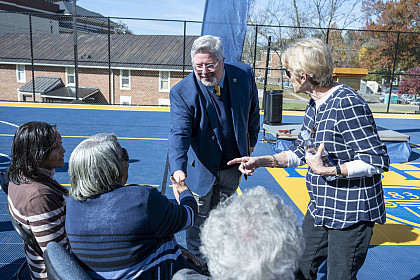 E&H President John W. Wells and Dr. Teresa Keller greet the family of Eric Scott