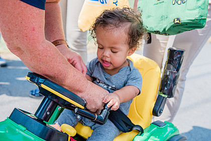 Zavier tries out his tractor.