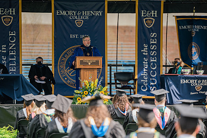 President John W. Wells speaks during commencement.