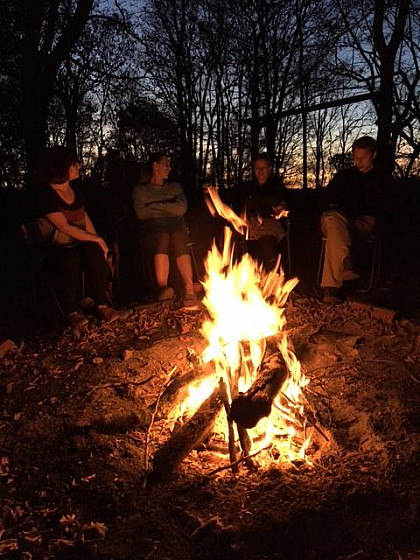 Students enjoying a campfire.