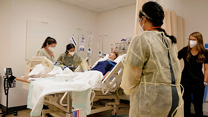 A group of E&H Nursing program students practice skills in one of the Health Sciences simulation labs.