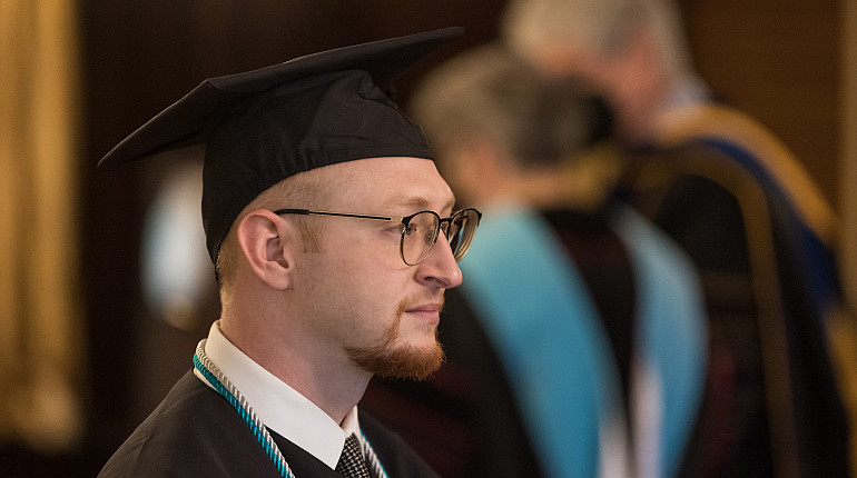 The Class 2022 President looks on